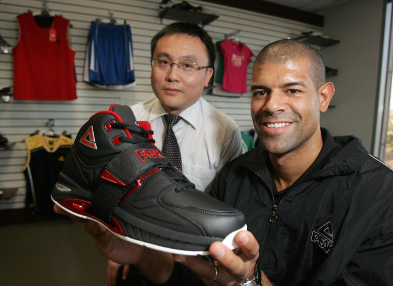 Chinese Shoemaker Jumps Through Hoops in U.S.