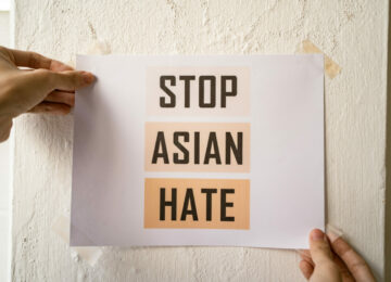 Stop Asian Hate sign attached on the wall