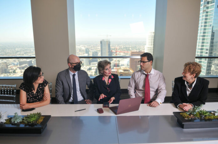 (left to right) Linh Duong, Senior Associate Ben Lambert, Head of nonprofit, higher education & healthcare practice. Betsy Berkhemer, President and Co-Founder of Berhemer Clayton, Inc. Shai Phillips, Head of Corporate Prictice LB Baer, Senior Associate at the City Club in downtown Los Angeles.