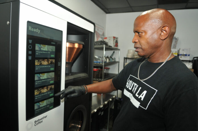 Joe Ward-Wallace, co-founder South LA Cafe, with his Bellwether Coffee Roaster