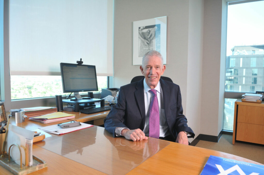 Marvin Schotland, retiring chief of Jewish Community Foundation, at his desk.
